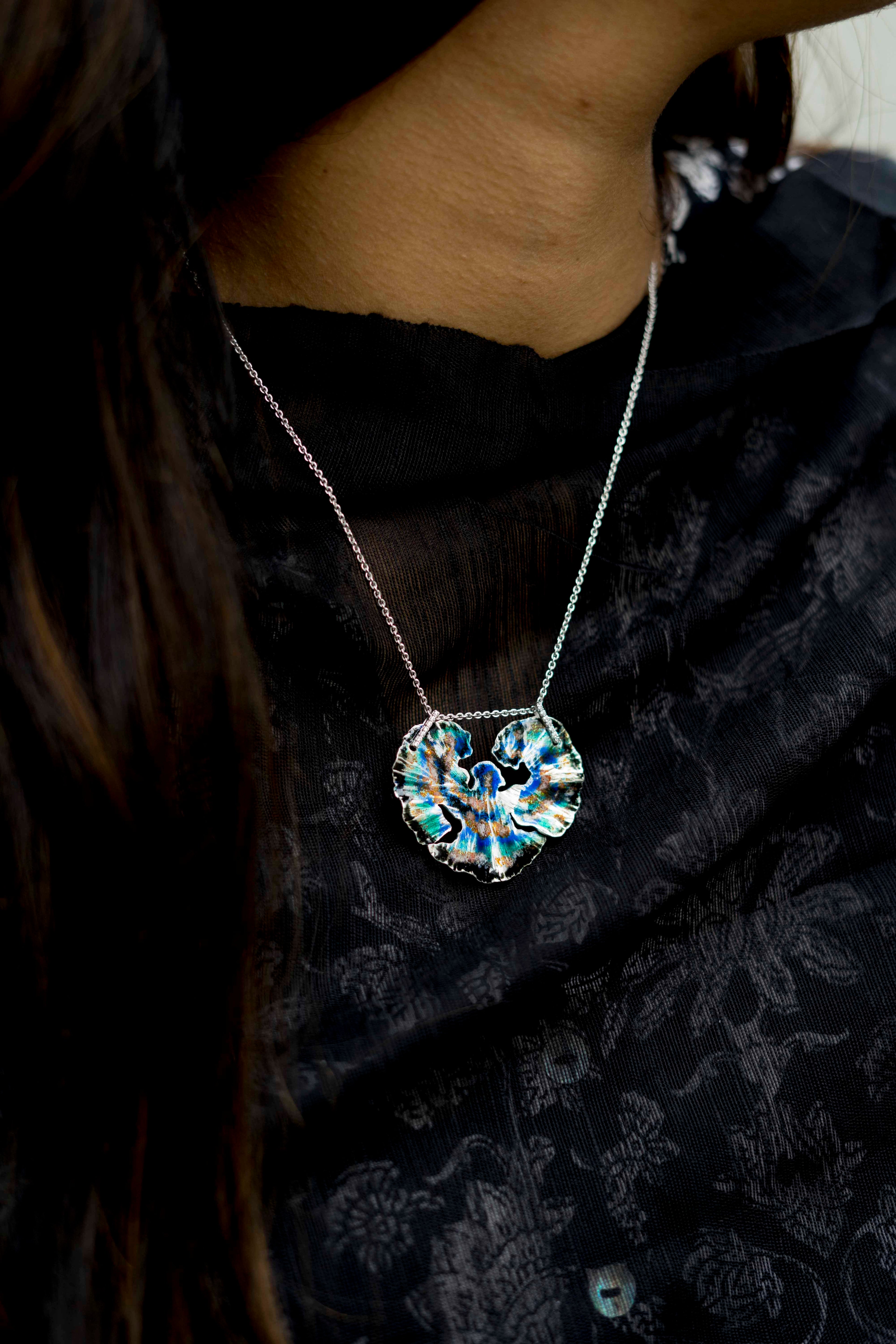 Black blue curl pendant